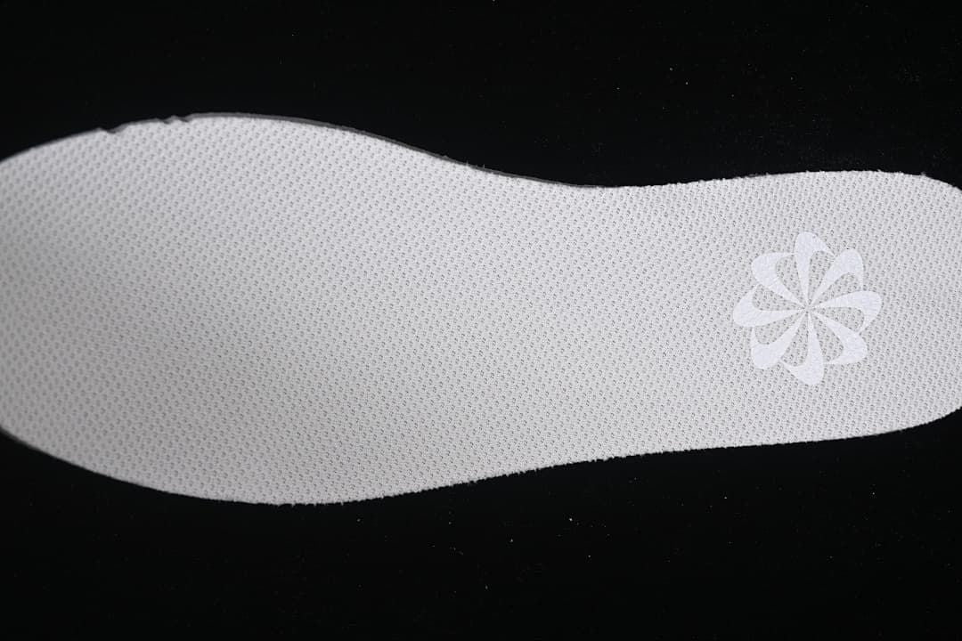 View of the shoe insole with a patterned logo
