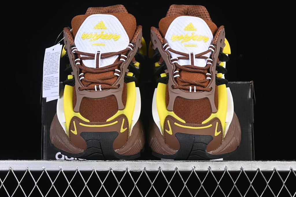 Front view of the pair showing the tongues, laces, and contrasting toe details