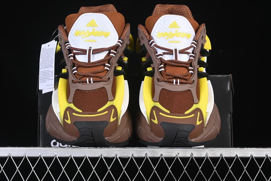 Front view of the pair showing the tongues, laces, and contrasting toe details
