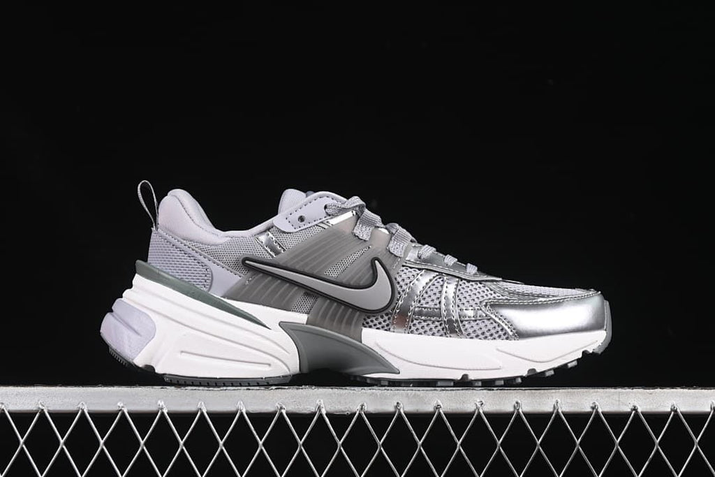 Side profile showing the layered upper and sculpted midsole