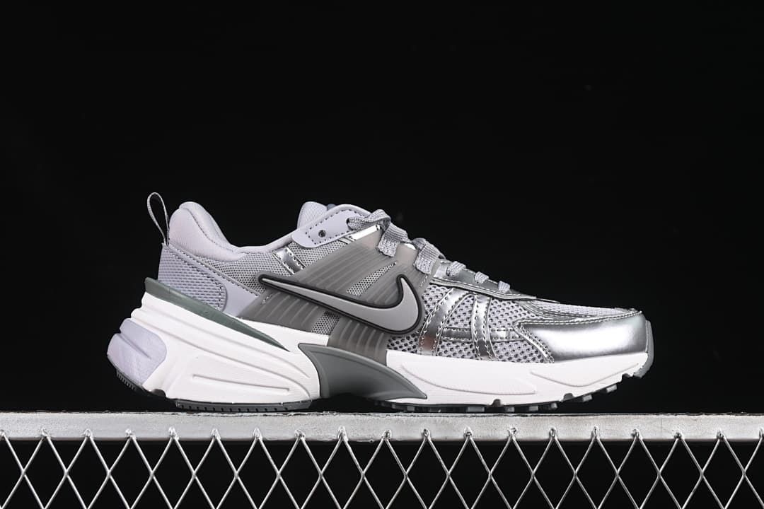 Side profile showing the layered upper and sculpted midsole