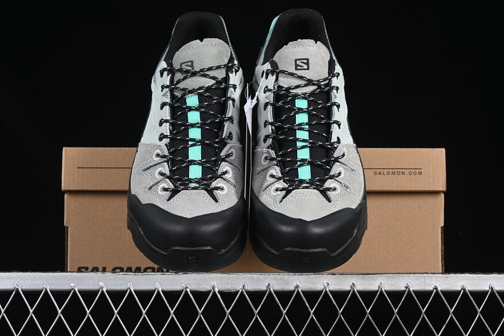 Front view of the pair showing the toe overlays and turquoise lace details.