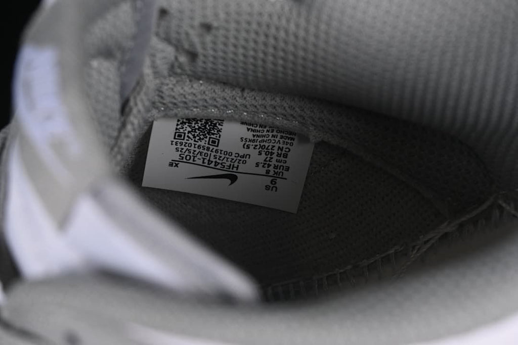 Inside size label showing US 9 and EU 42.5