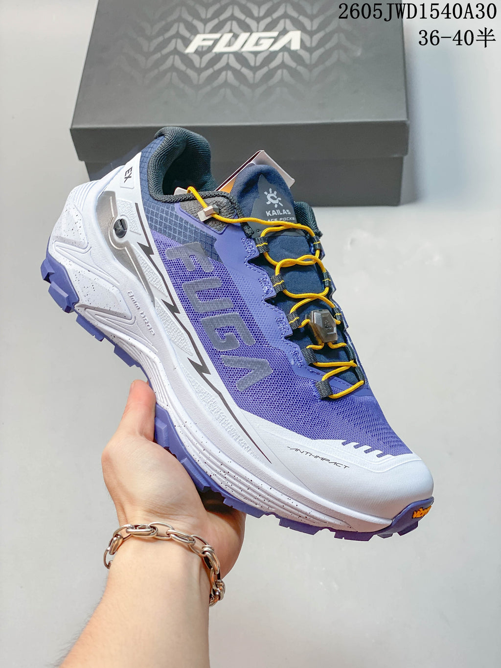 Gray Kailas FUGA low-top shoe with dark blue detailing and a gray lugged outsole.