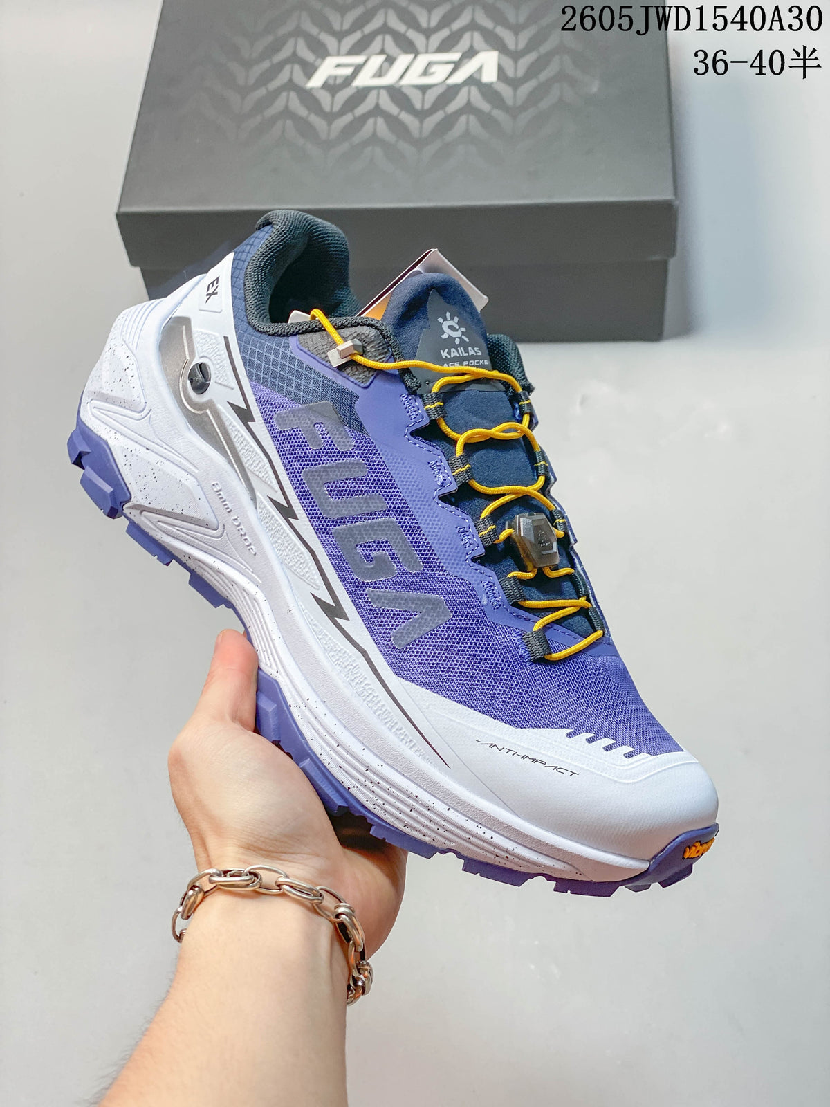 Gray Kailas FUGA low-top shoe with dark blue detailing and a gray lugged outsole.