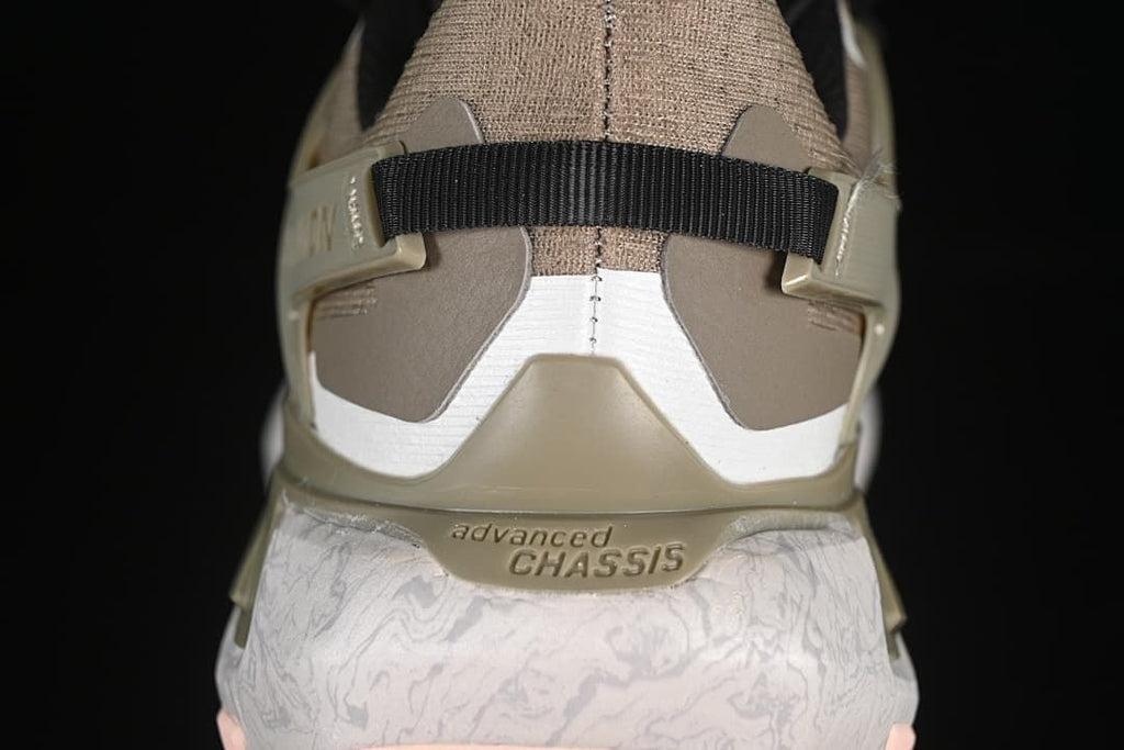 Rear view showing the heel support and patterned midsole