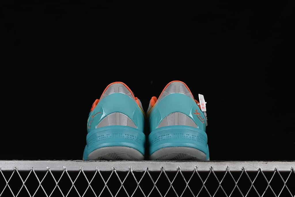 Rear view of the pair showing turquoise heel sections