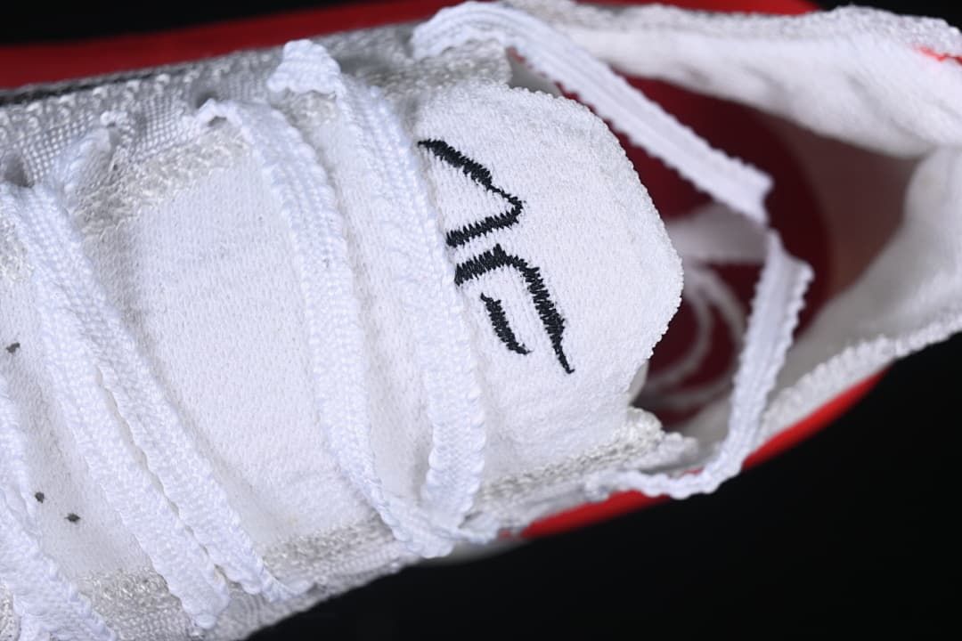 Close-up of the tongue, laces, and white upper