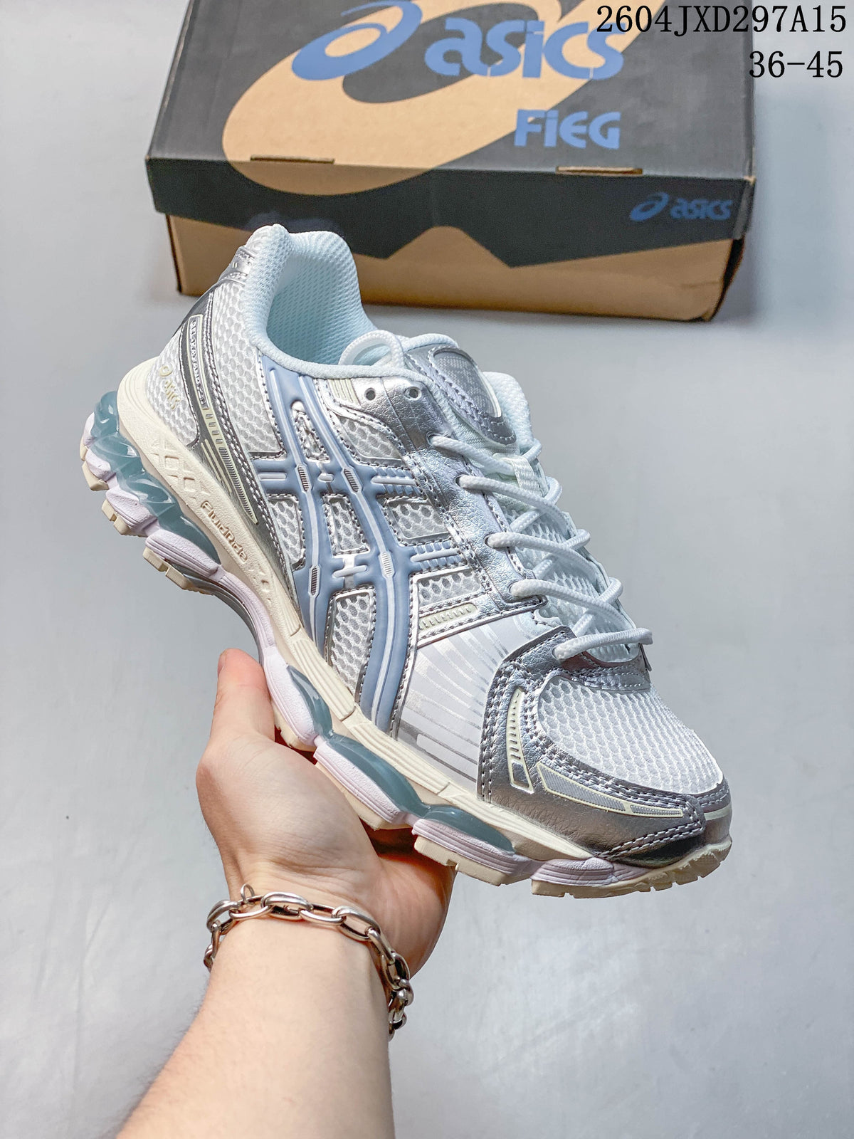Angled side view of the silver-blue and white sneaker