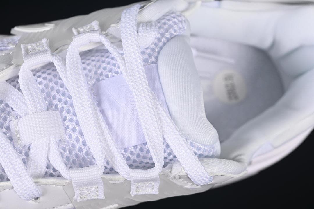 Close-up of the lace-up area and mesh tongue.