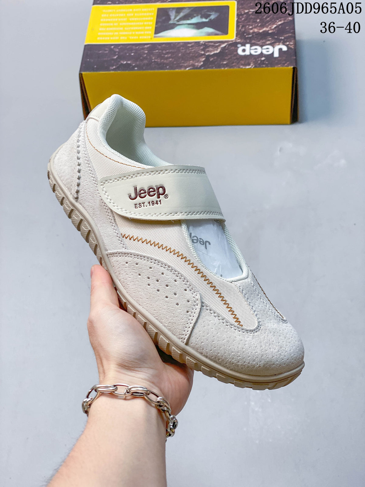 Side view of a light beige Jeep casual shoe showing its strap, stitched panels and textured outsole.