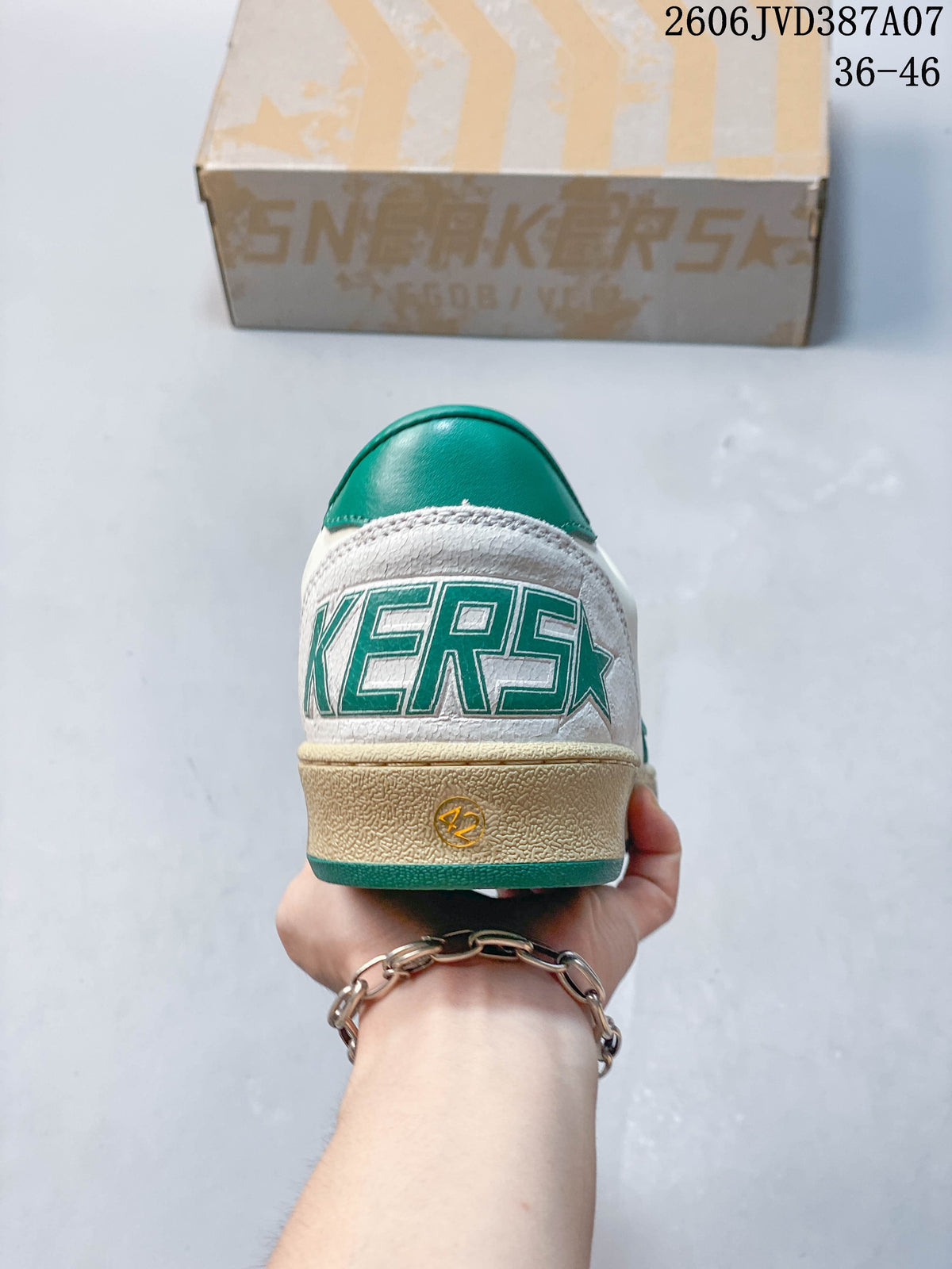 Rear view showing the green heel panel and distressed-look beige sole.