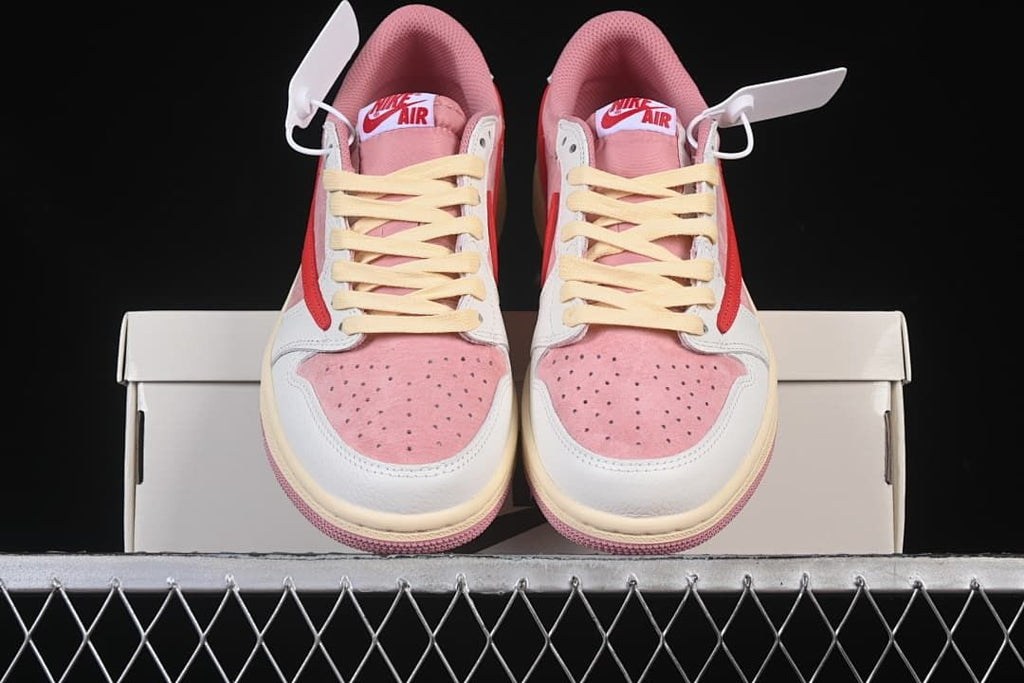 Front view of the pair showing pink perforated toe panels