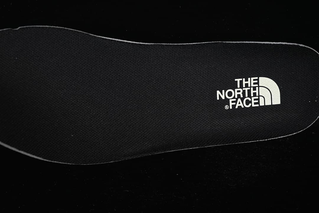 Close-up of the shoe insole with The North Face branding.