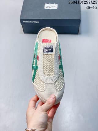 Top view of the cream slip-on sneaker showing its padded collar, patterned upper, and colored side stripes.