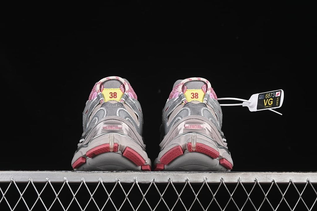 Rear view of both sneakers showing heel details and size 38 markings.