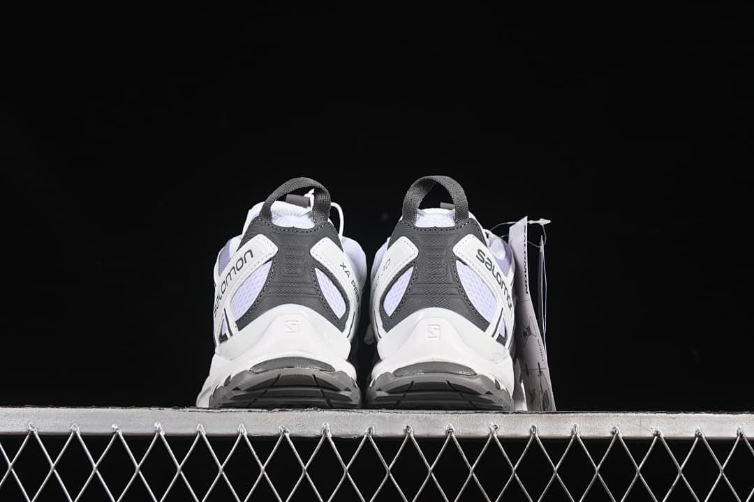 Rear view of the pair showing heel structure and outsole edges