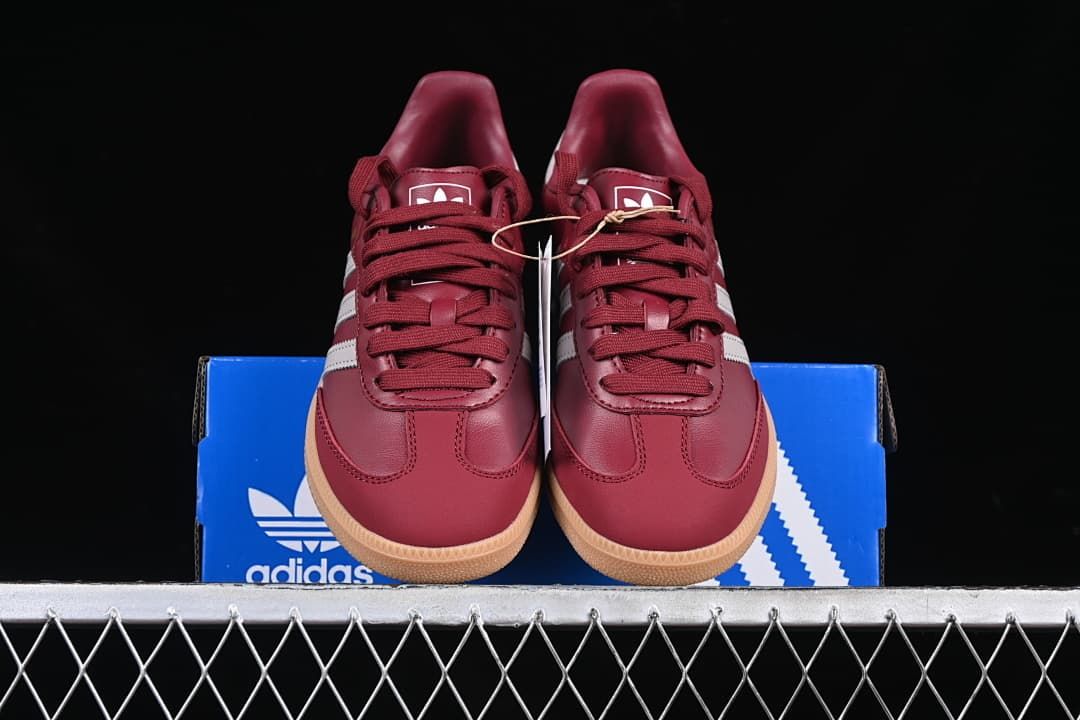 Front view of the pair with burgundy uppers and gum-colored soles