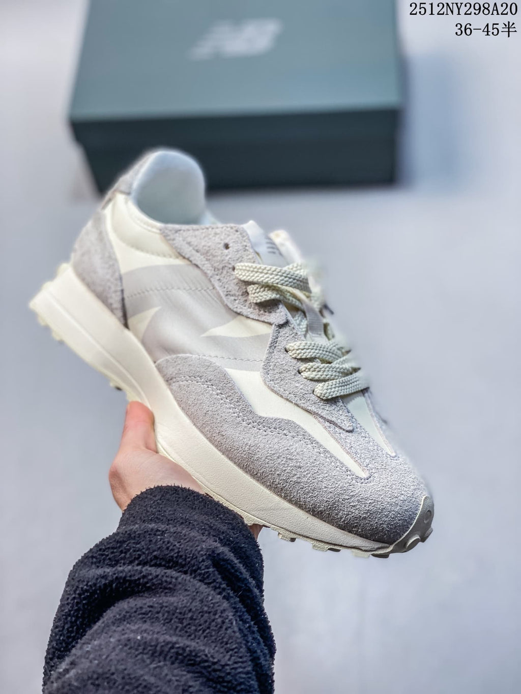 New Balance 327-style sneaker in light gray and white with textured overlays
