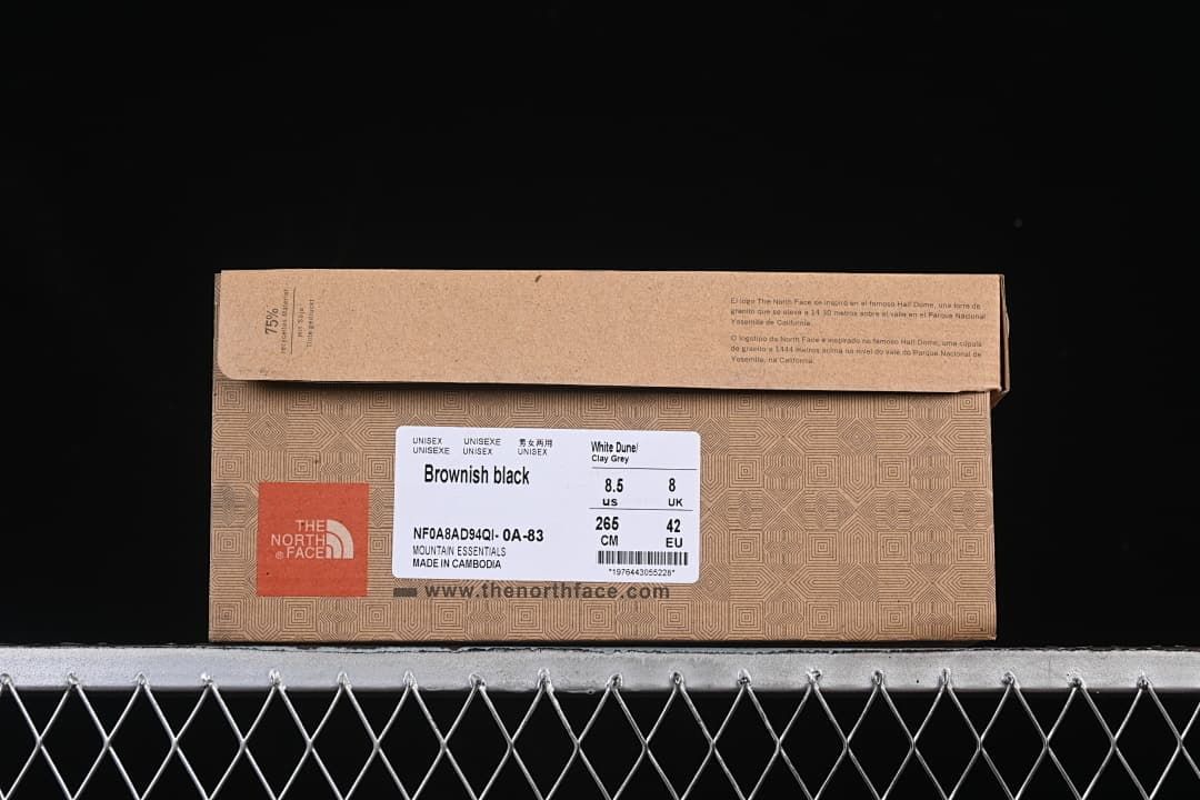Shoe box label showing Brownish black, product code NF0A8AD94QI-0A-83, and a sample size of US 8.5, UK 8, EU 42, and 265 cm as printed