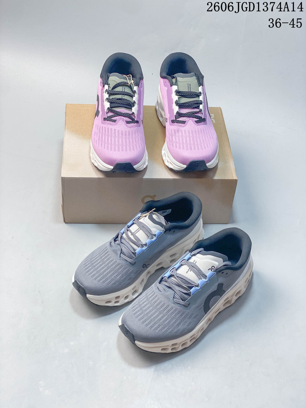 Gray-blue and lilac On Cloudmonster 3 shoes shown in a group.