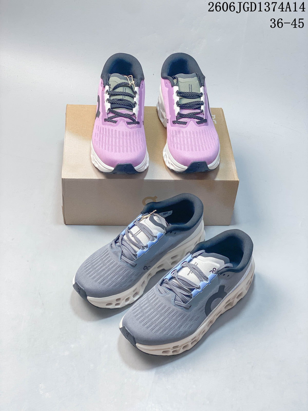 Gray-blue and lilac On Cloudmonster 3 shoes shown in a group.