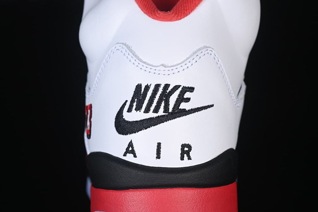 Rear view showing Nike Air branding and red accents