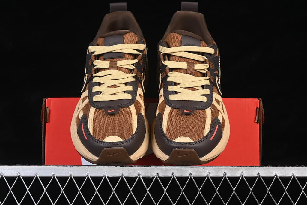 Front view of the pair showing the toe panels and laces