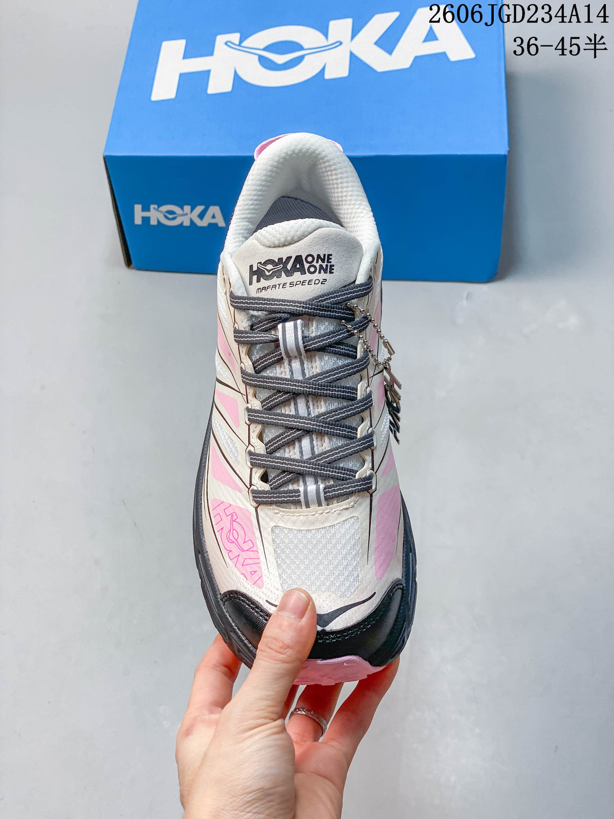 Top view showing the laces, padded collar and light-colored upper