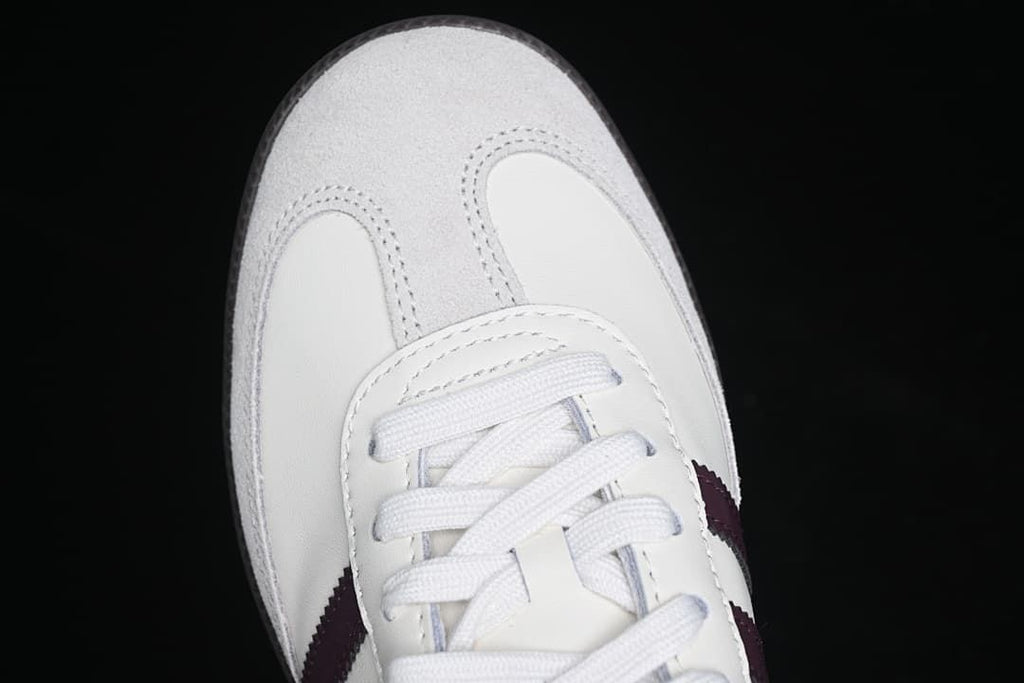 Top view of the white toe with suede-like overlay details