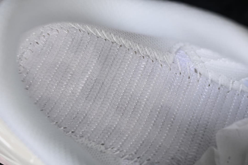 Close-up of the sneaker’s textured mesh-look upper and stitching