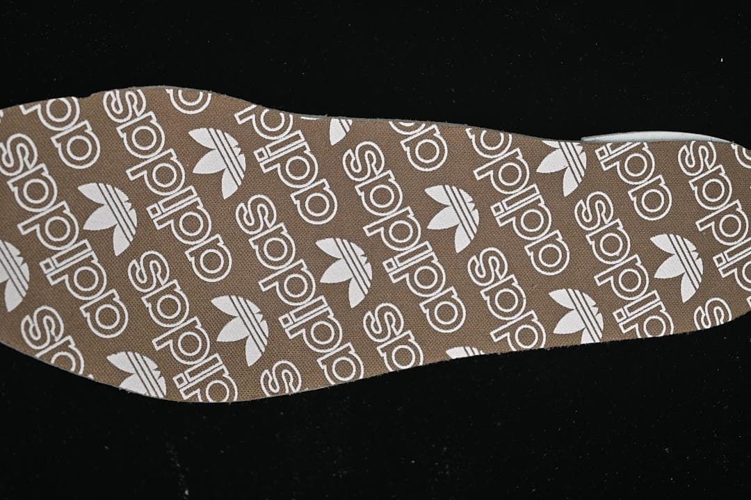 Close-up of the brown branded insole.