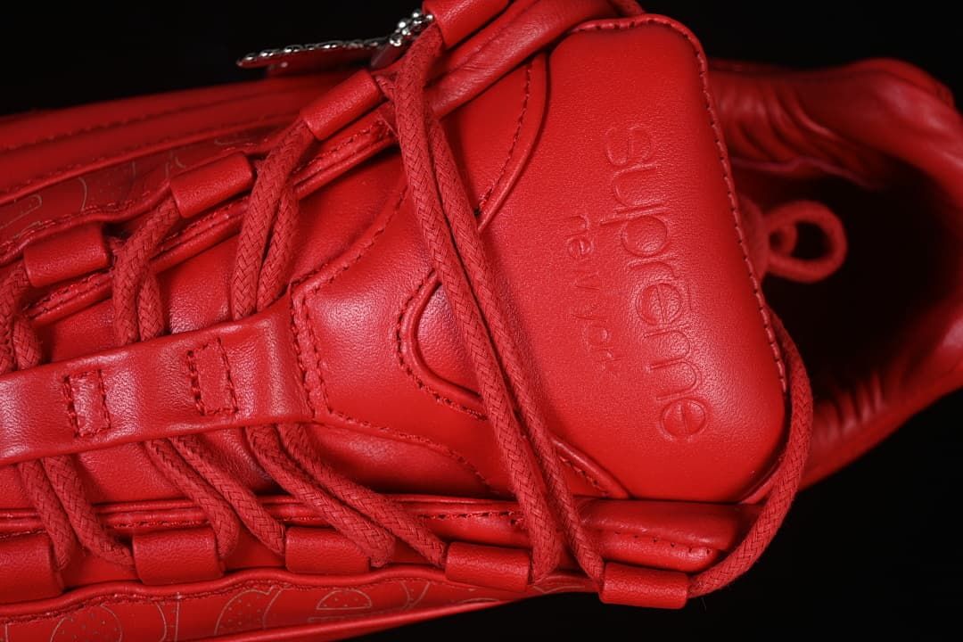 Close-up of Supreme branding on the tongue and lace details