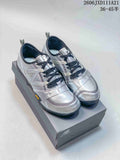 Silver-toned New Balance MT10OIY low-top sneakers with dark laces