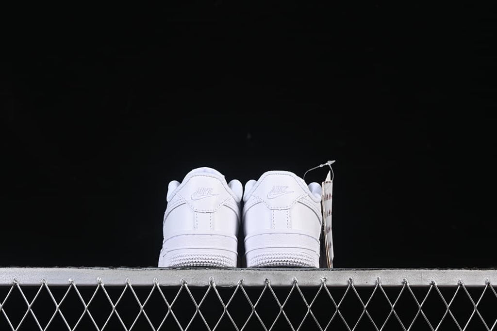 Rear view of both sneakers showing heel panels