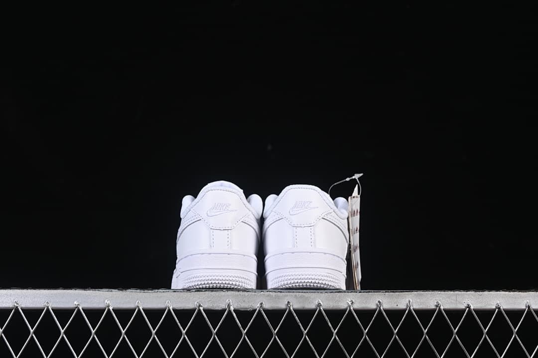 Rear view of both sneakers showing heel panels