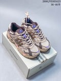 Beige and brown adidas Response CL sneakers with purple accents on a Bad Bunny-branded box