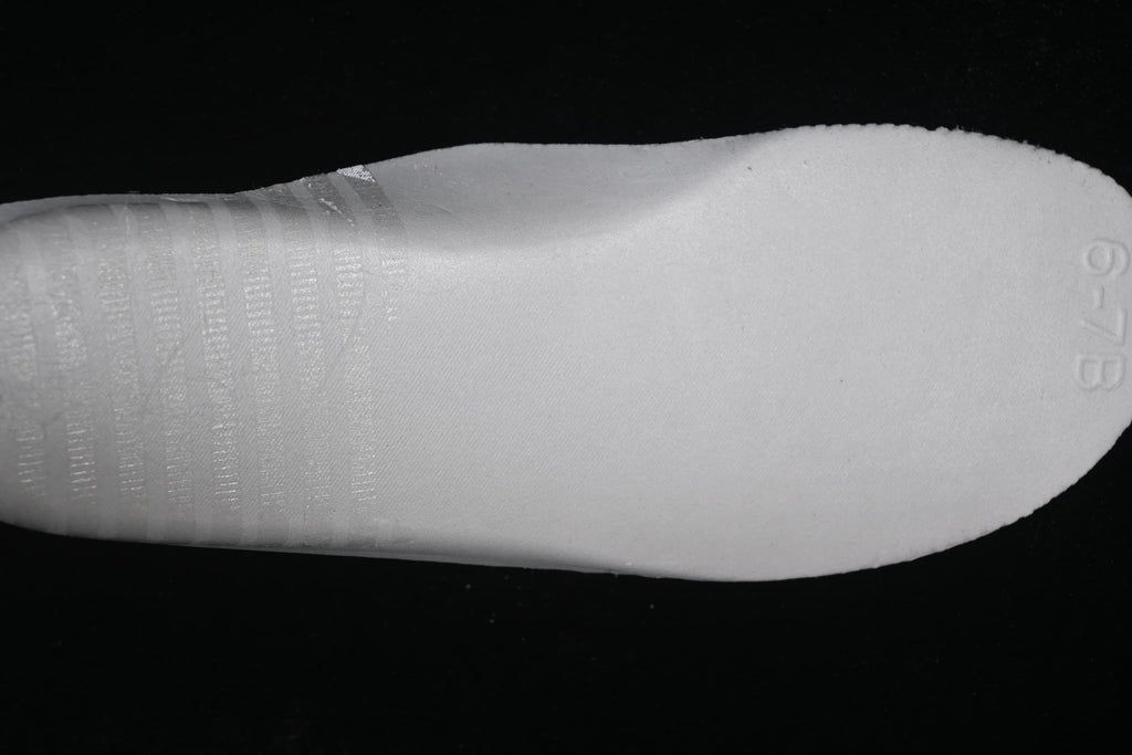 Light-colored insole photographed separately