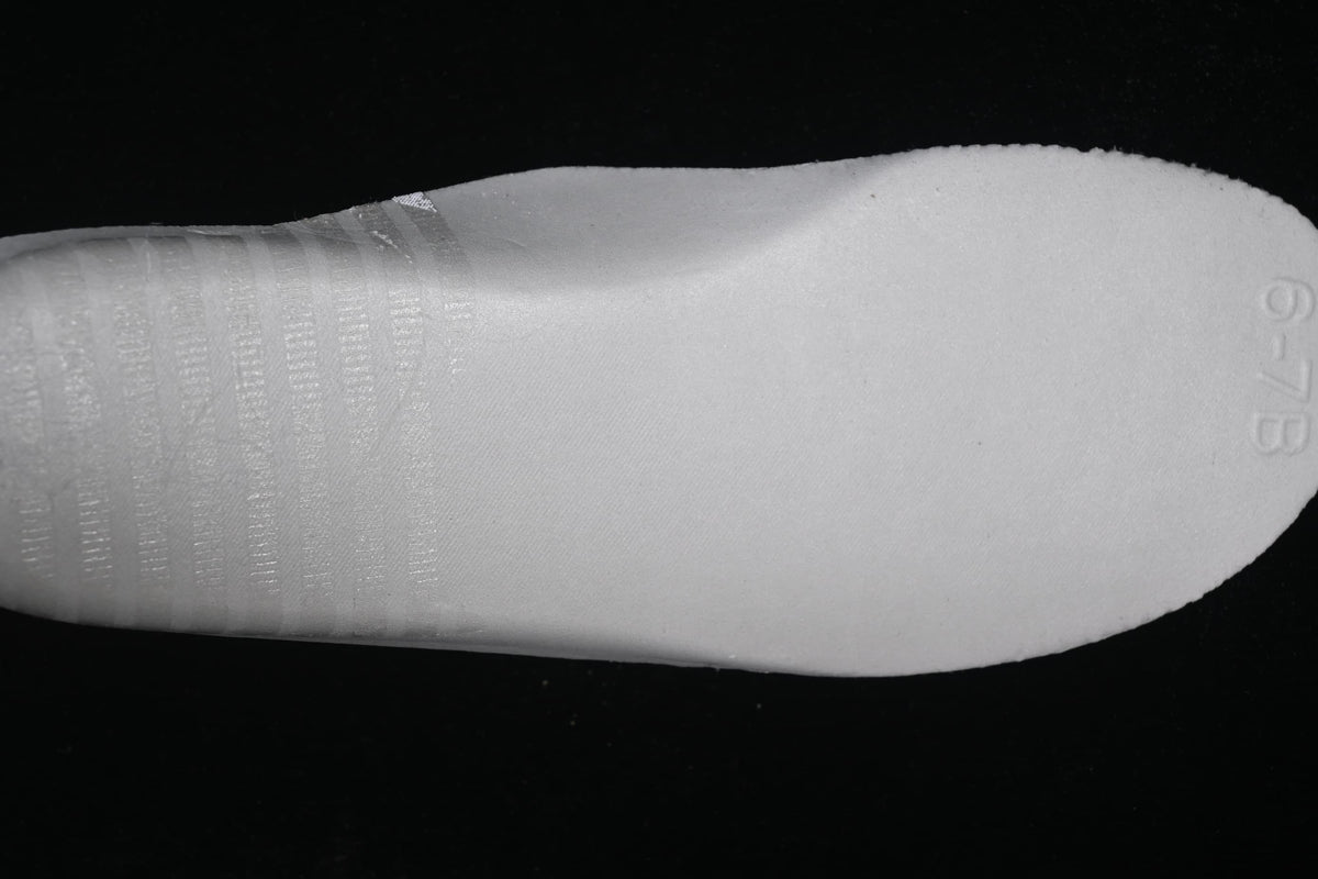 Light-colored insole photographed separately