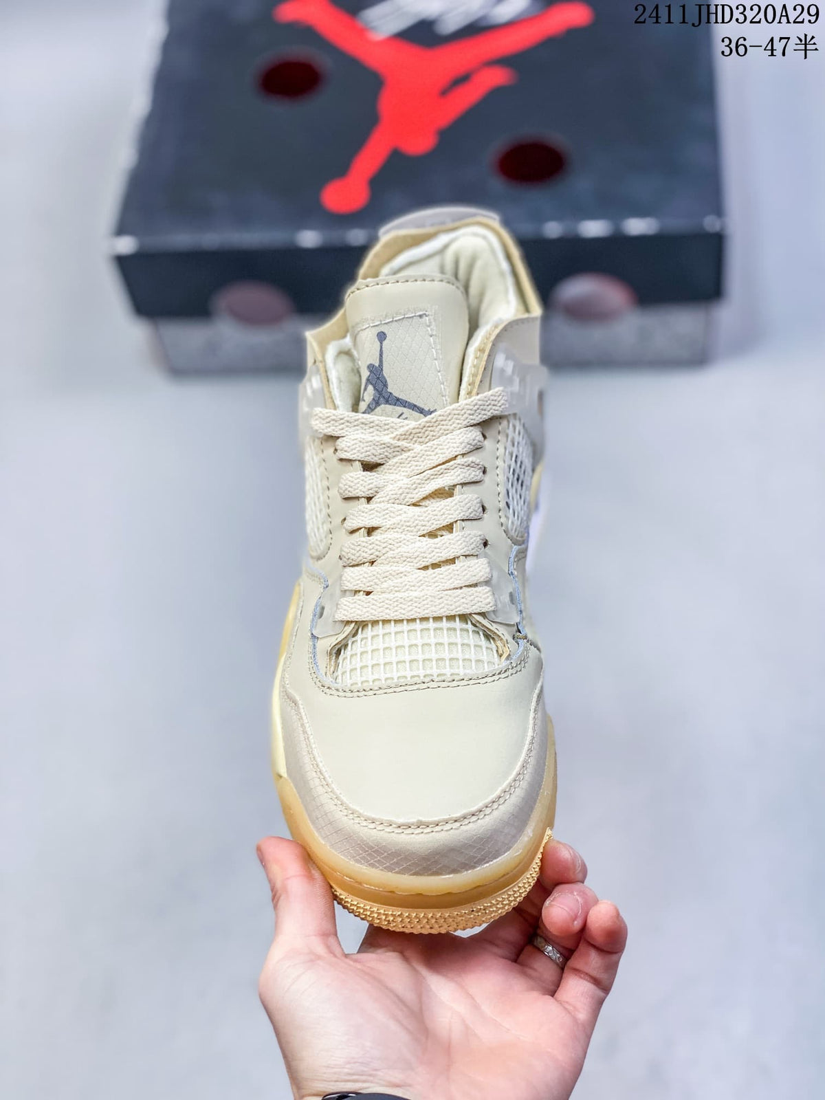 Front view highlighting the laces, mesh tongue panel, and light-colored upper.