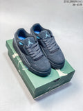 Pair of dark charcoal Jordan Flight Court ATE low-top sneakers with blue accents displayed on a green shoe box