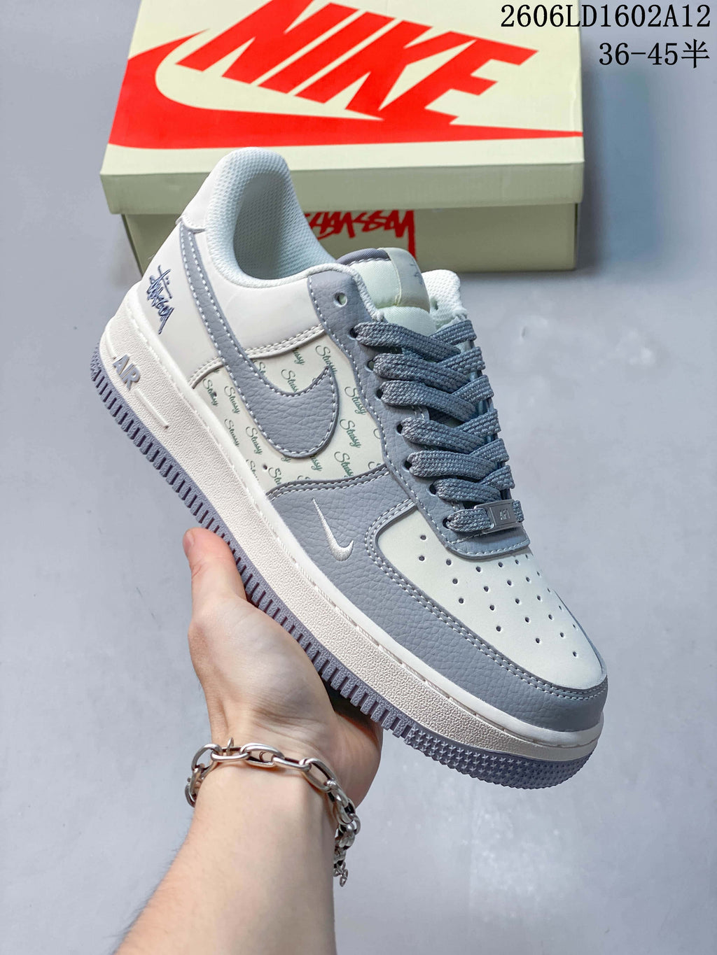 Angled view of an off-white and grey low-top sneaker