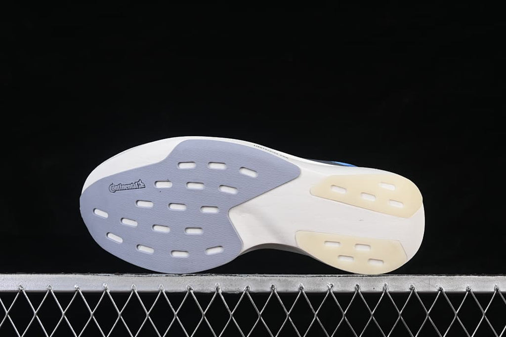 Outsole view showing segmented rubber sections and Continental branding.