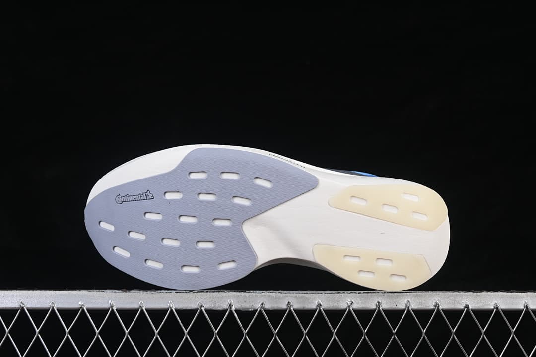 Outsole view showing segmented rubber sections and Continental branding.