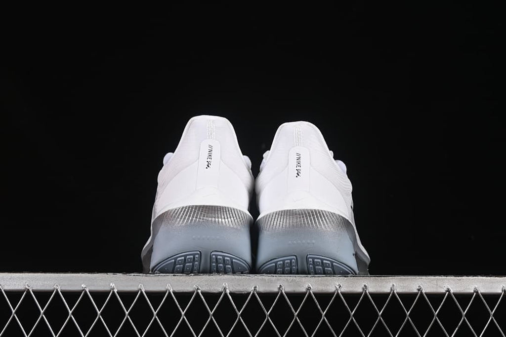 Rear view of the pair showing gray-blue midsoles and outsole details.