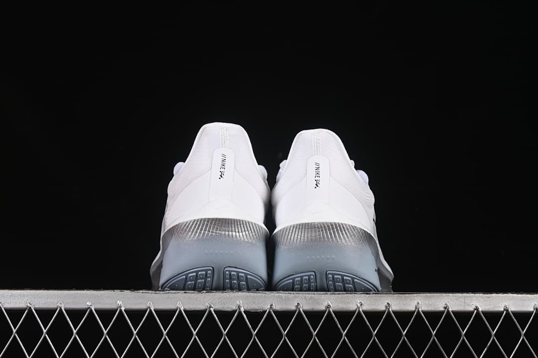 Rear view of the pair showing gray-blue midsoles and outsole details.