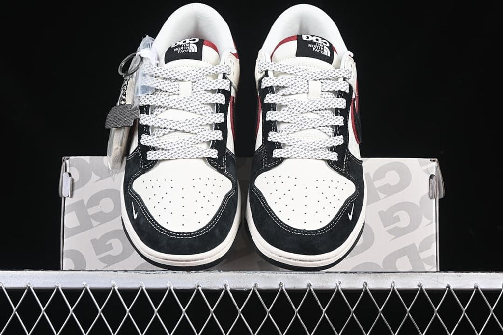 Front view of the pair showing perforated toe panels and patterned laces