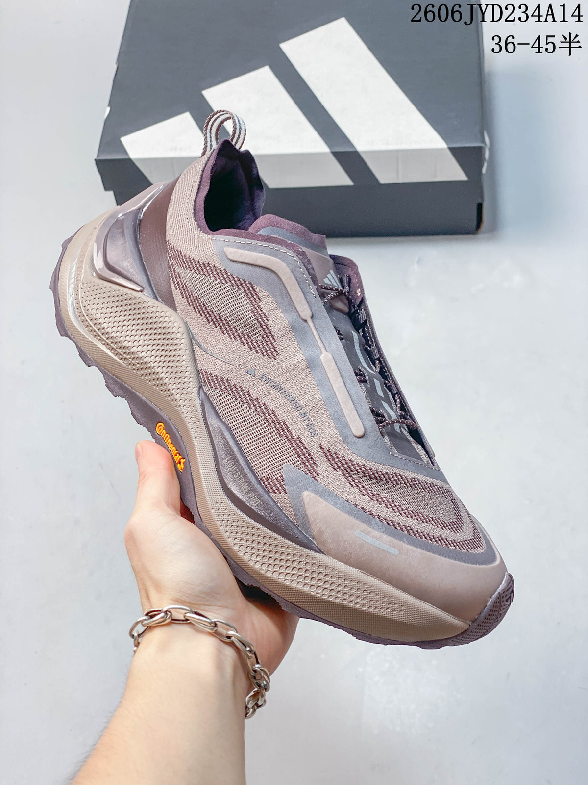 Angled side view of the mauve and gray Adidas Holo Peak trail running shoe