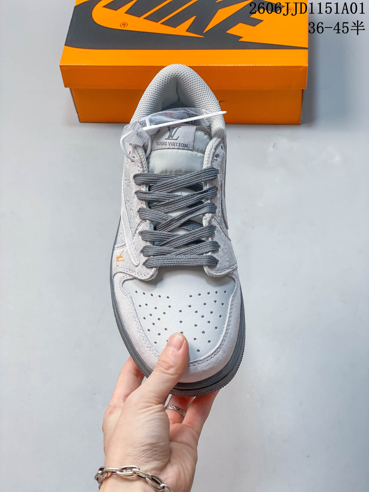 Top view of the sneaker showing perforated toe, gray laces, and padded collar