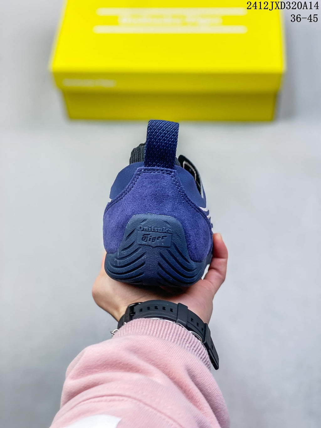 Rear view of the blue sneaker showing the heel branding and pull tab